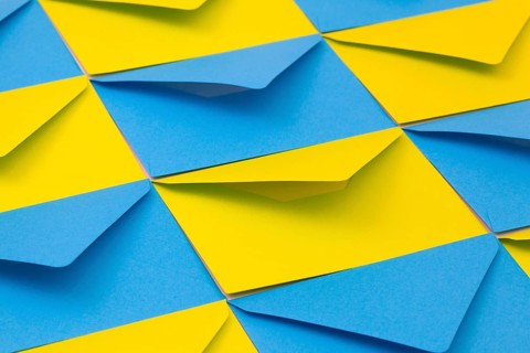 Different yellow and blue envelopes on the table