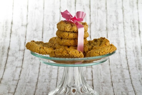 Delicious biscuits on a decorative background