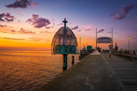 The Zinnowitz pier with diving bell in summer shortly after sunset