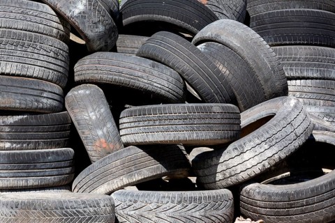 Old and used car tyres on a pile