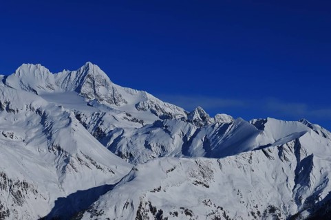 Panoramic mountain view of the Grossglockner Snow mountain range in East Tyrol from the Adler