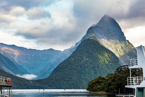Port of tourist and pleasure boats of the Milford Sound fjord. The magical nature of the southern