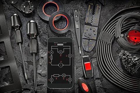 Big Black Electric Tools Set Smartphone Display With Blueprint On Abstract Stone Background