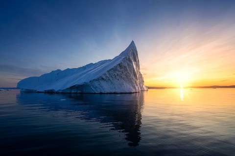 Floating glaciers in the rays of the setting sun at polar night