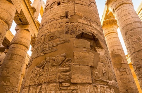 Sunlight over great columns of Karnak Temple in Luxor, Egypt, Africa