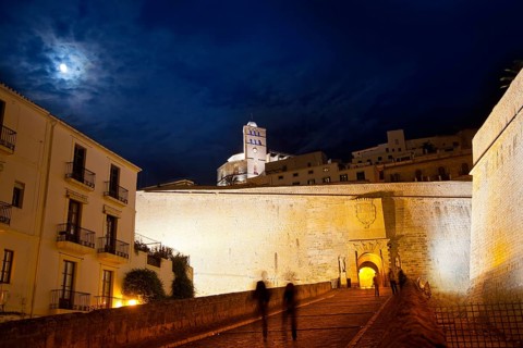 Eivissa Ibiza town with night moon castle entrance and Church