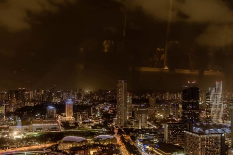 Singapore City, Singapore, January 23, 2019: Beautiful aerial night view of Marina Bay and the
