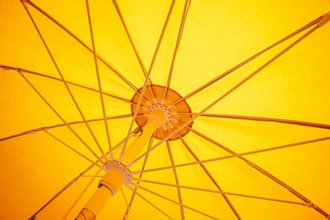 An image of a yellow sunscreen umbrella inside