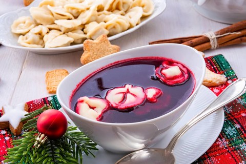 Red barzcz with uszka a polish christmas soup