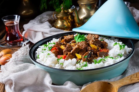 Tajin beef stew with rice, peppers and sesame seeds