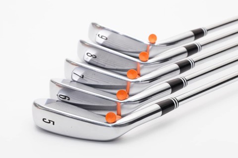 Titanium golf clubs on the white background