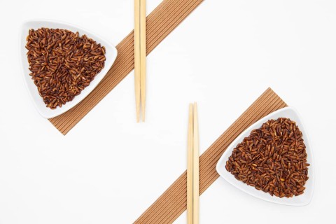 Top View Of White Sushi Plate With Rise And Chopsticks. Symmetry Food Design