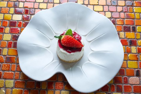 Cheesecake with cranberries sauce dessert