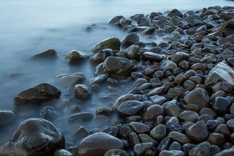 Time exposure of stones in the Westfjords coast, Iceland, Europe
