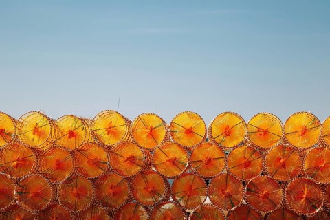 Stacked orange fishing trap net at BaeksaJang port in Anmyeondo Island, Taean, Korea