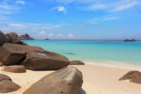 Similan Islands, Andaman Sea, Thailand. Finest white sand beach adjacent to the great brown cliffs