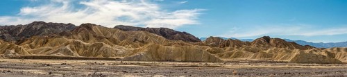 Scenic panoramic view of yellow colored mountains in the Death Valley NP, USA, North America