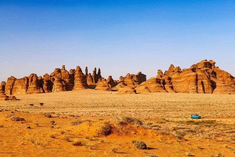 Vintage Land Rover Tour in the rocky landscape of Hegra, Unesco World Heritage Site Al Ula, Kingdom