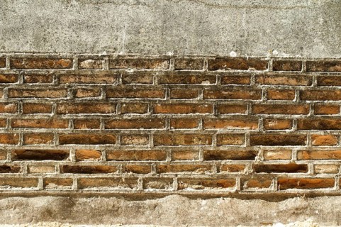 Ancient Brick Wall. River dike