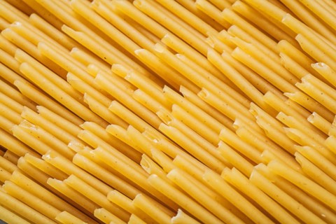 Thin spaghetti background food and drink concept
