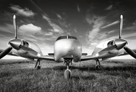 sports plane against a cloudy sky