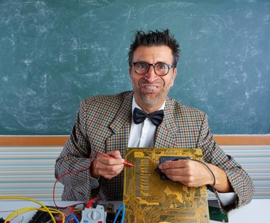 Nerd electronics technician retro teacher silly expression working in pcb
