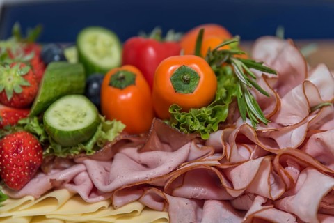 Healthy cold platter with a variety of food, fruit and vegetables