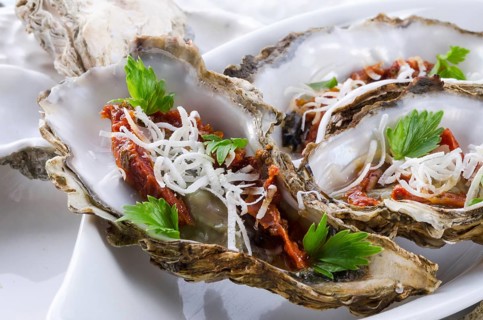 Oysters with parmesan and baked tomatoes