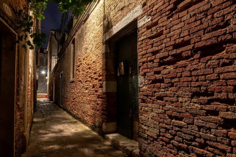 Old Brickwall in a narrow Alley in Cannaregio District, Venice, Italy, Europe