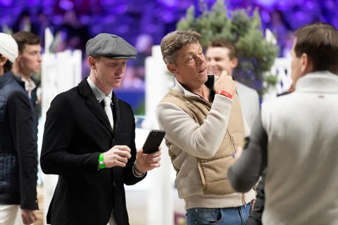 Daniel Coyle of Ireland inspects the course ahead of the 1.60m FEI Jumping World Cup at Jumping