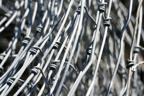 Old wire mesh, fence wire, metal structure closeup