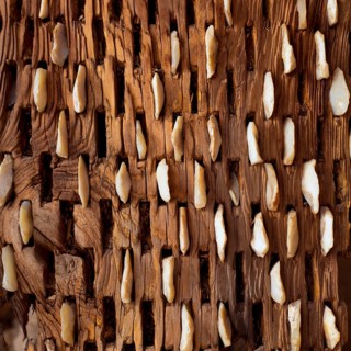 Threshing board for wheat of aged wood and stones texture vintage pattern