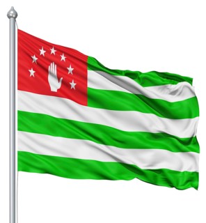 Flag of Abkhazia with flagpole waving in the wind against white background