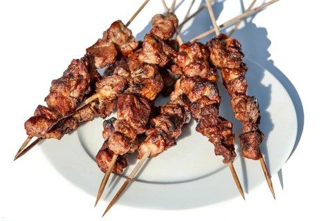 Lamb kebab shashlik from the grill on a wooden skewer