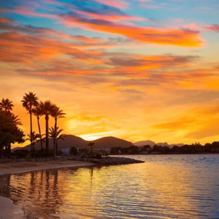 Alcudia Majorca at sunset on the beach Mallorca Balearic islands