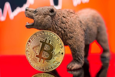 Bitcoin with a red chart drop. Price crash and bear market trend concept