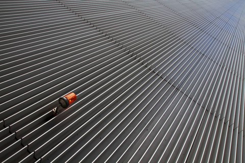 Converging lines on a skyscraper and an alarm light Frankfurt, Germany, Europe
