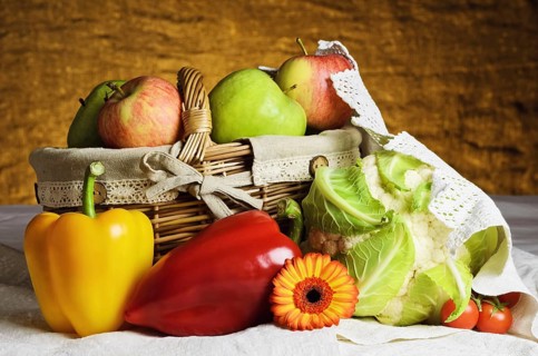Still life of vegetables and fruit with basket. Daugavpils, Latvia, Europe