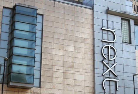 Manchester, united kingdom, 24 march 2022: sign on the front of the next clothing store in exchange