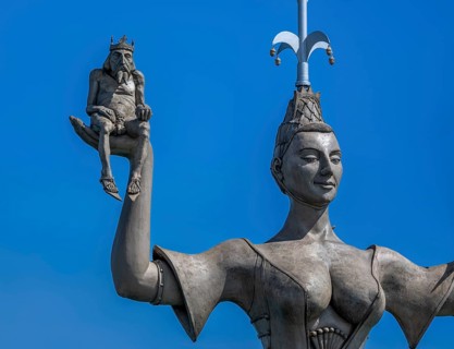 Royal figure on the right hand of Imperia, a rotating, nine-metre-high concrete statue in the port