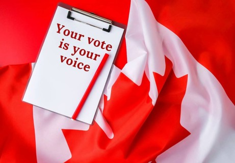 The National Flag of Canada. Canadian Flag or the Maple Leaf with paper note message text. Election