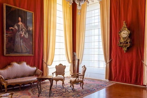 Venaria Reale, Italy, February 2023: luxury interior, old Royal Palace. Perspective with harp,
