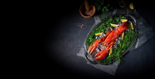 The cooked lobster on ice