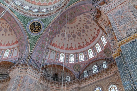 A picture of the colorful and gorgeous interior of the New Mosque, in Istanbul