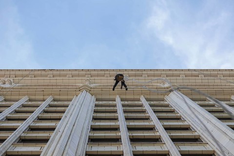 Window cleaner on a historic building facade in Chicago, IL, USA, Chicago, United States, North