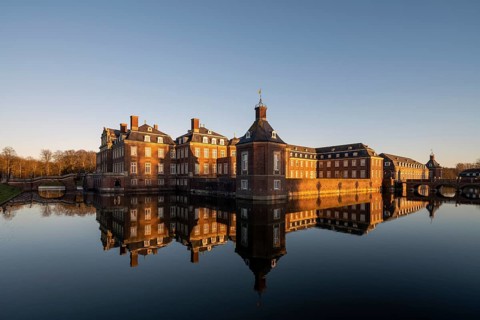 Nordkirchen, castle, completed in 1734, view over the moat in the evening light, Westphalian
