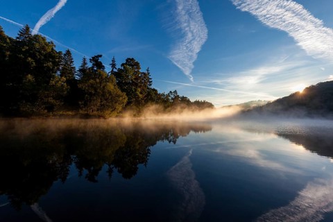 Lake with morning fog Light mood
