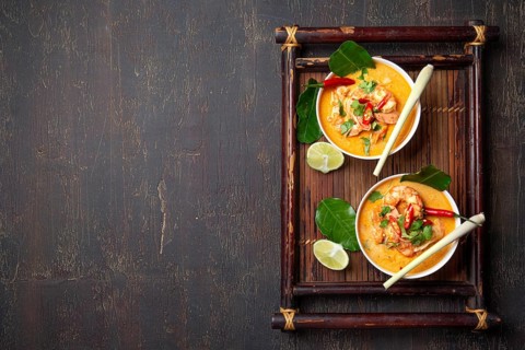 Food, Food, Shrimps Tom Yam Kung in grey bowl with thai spices on autentic tray top view, wooden