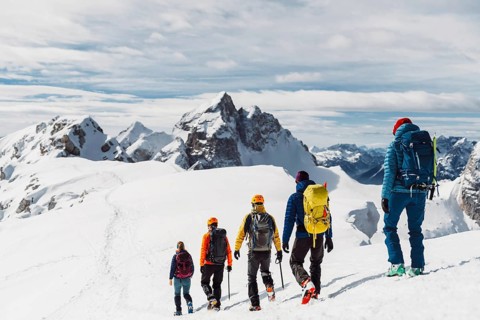 Mountaineer backcountry ski touring in the mountains. Ski touring in high alpine landscape with
