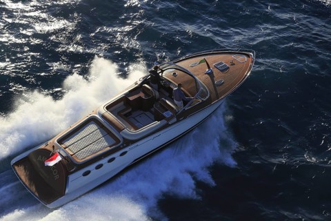 Aerial view sports boat J Craft 42 Torpedo R at full speed on the Cote d'Azur, luxurious motorboat